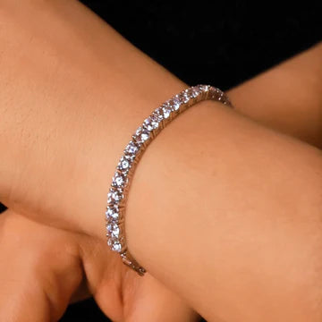 Stone-set bracelet worn on a wrist
