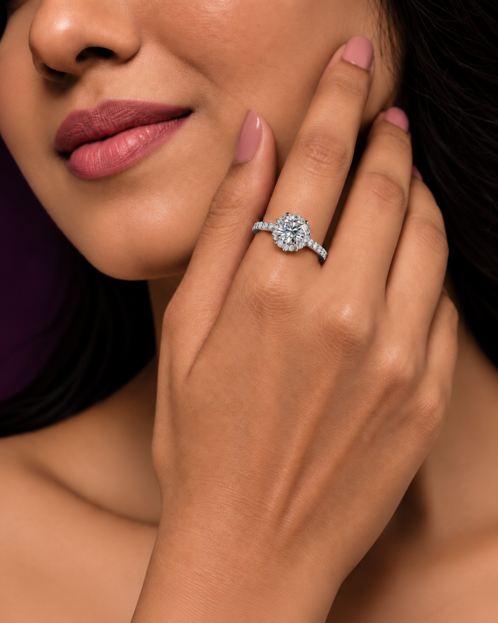 1 Carat Moissanite Eternal Halo Ring worn by a woman