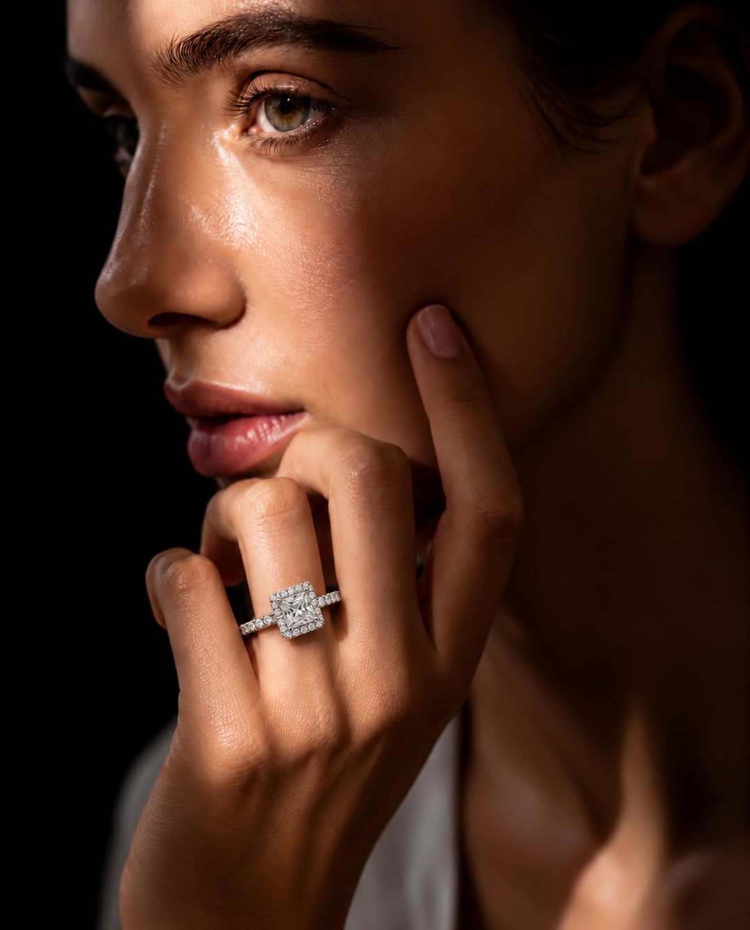 1 Carat Princess Cut Four Seasons ring worn by a woman
